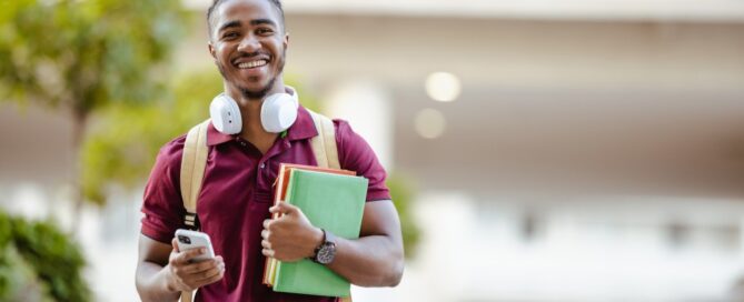 A college student makes his way across campus