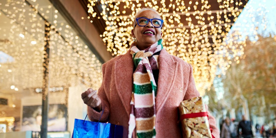 A woman conducts her Christmas shopping.